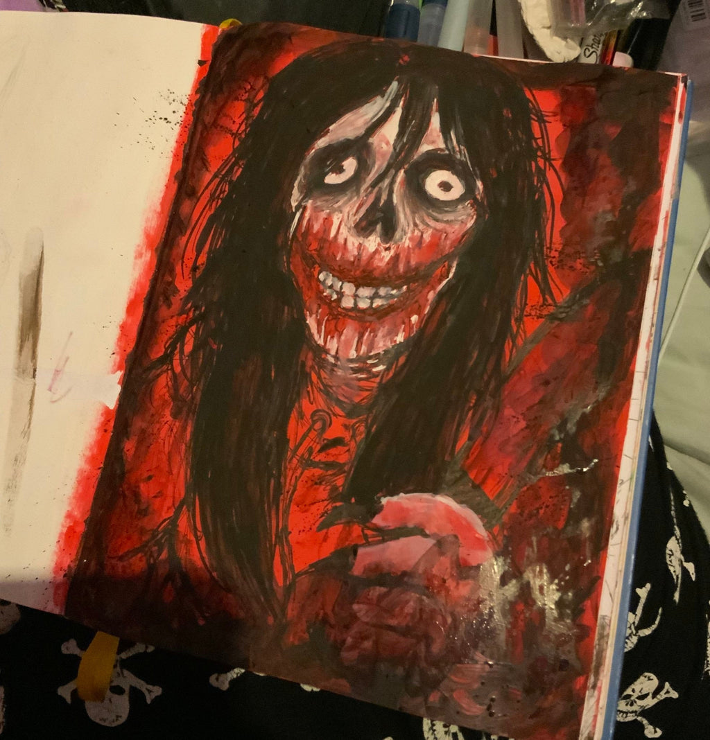 Artistic depiction of a character with dark hair and red accents in a sketchbook
